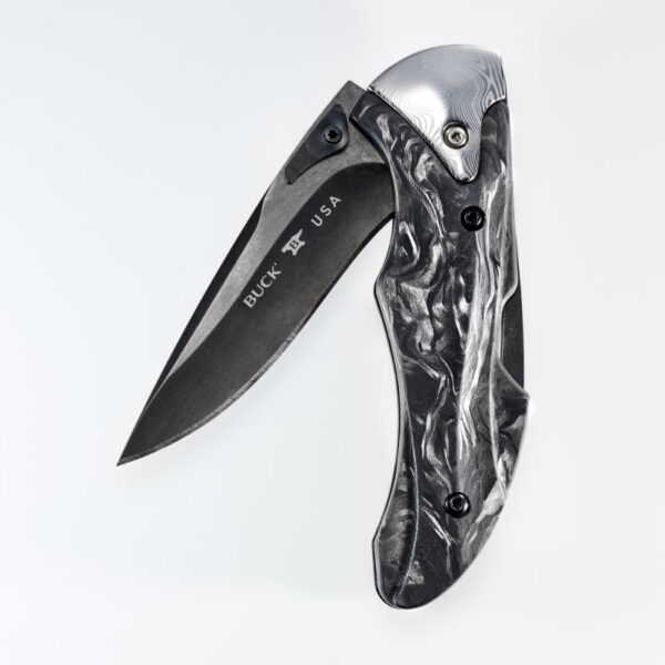 Knife handle made of Black Marble Carbon Fiber