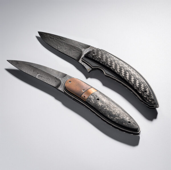 Knives with handles made from Black Marble Carbon Fiber