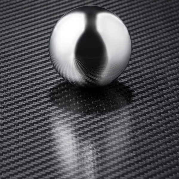 6k 2x2 Twill weave carbon fiber - with ball to display reflectiveness of semi-gloss finish